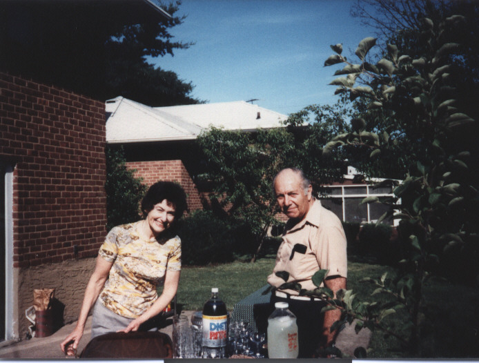 Mom and Dad at a backyard barbeque in Syosset